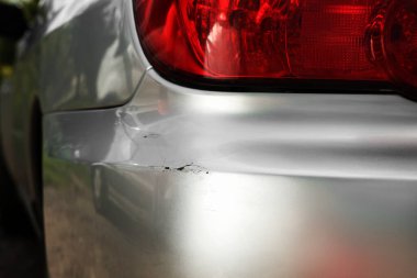 Modern gray car with scratch, closeup view