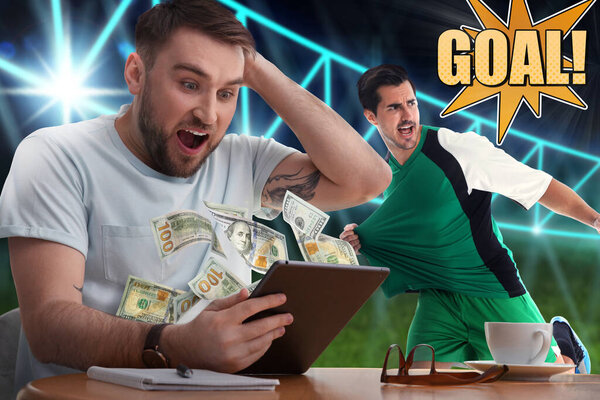 Happy man won on sports betting. Money flying out of tablet. Player scoring goal at stadium on background