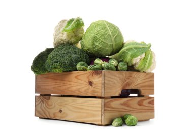 Wooden crate with different types of fresh cabbage on white background