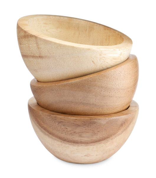 Set of wooden bowls on white background