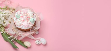 Traditional Easter cake with meringues and painted eggs on pink background, top view. Banner design with space for text