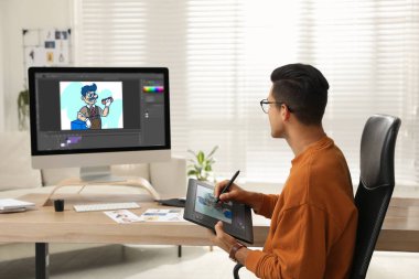 Grafik tablet ve bilgisayar kullanan bir animasyon. Ekrandaki Görüntü