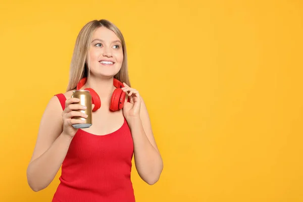 Beautiful Happy Woman Holding Beverage Can Yellow Background Space Text — 스톡 사진