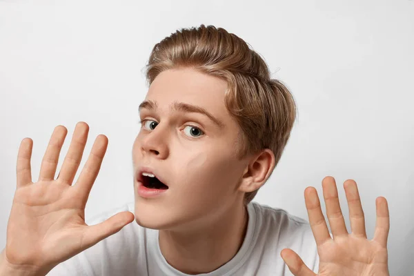 Shocked Teenage Boy Stuck Transparent Screen — Fotografia de Stock