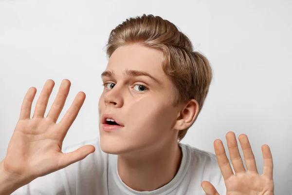 Shocked Teenage Boy Stuck Transparent Screen — Stok fotoğraf