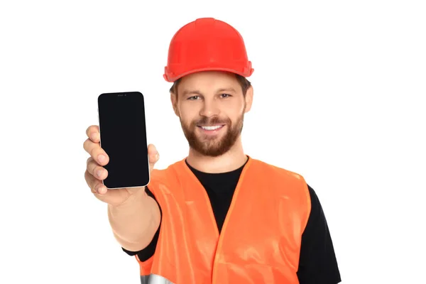 Mann Reflektierender Uniform Zeigt Smartphone Auf Weißem Hintergrund — Stockfoto