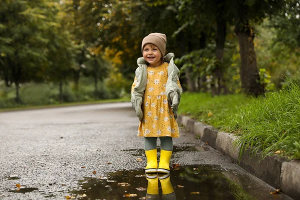 Cute Little Girl Standing Puddle Outdoors — ストック写真