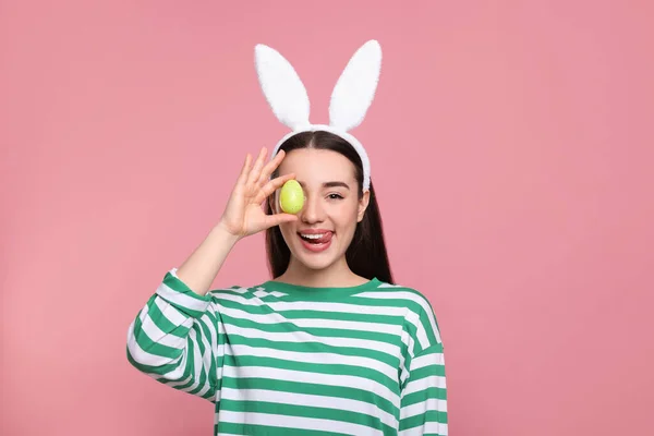 Happy Woman Bunny Ears Headband Holding Painted Easter Egg Pink — Stockfoto