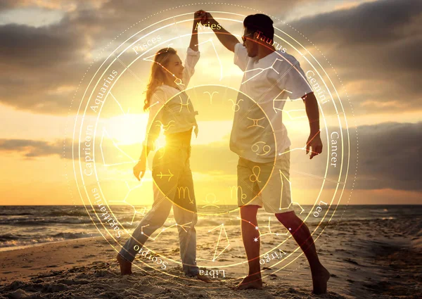 Horoscope Compatibility Loving Couple Beach Sunset Zodiac Wheel — Stockfoto