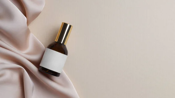 Bottle Luxurious Perfume Beige Silk Fabric Light Background Top View — Foto de Stock