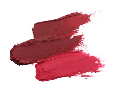 Smears of bright lipsticks on white background, top view