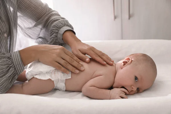 Mother Massaging Her Little Baby Changing Table Indoors Closeup — Stok fotoğraf