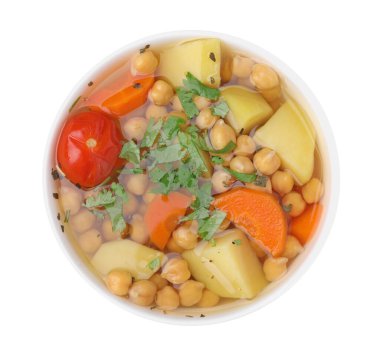 Tasty chickpea soup in bowl on white background, top view