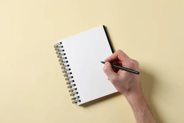 Man Pen Empty Notepad Yellow Background Top View — Stock fotografie