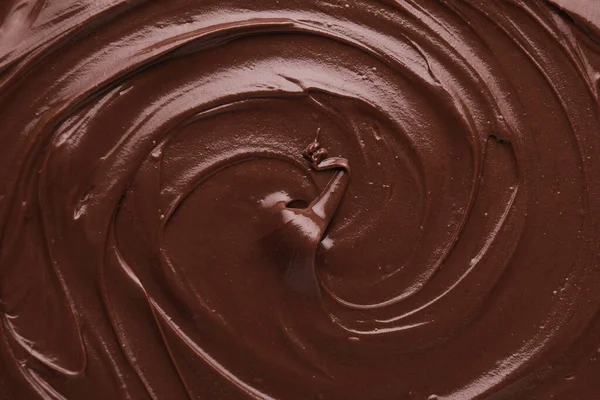 Delicious chocolate paste as background, top view