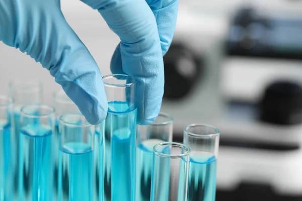 Scientist Taking Test Tube Light Blue Liquid Laboratory Closeup — Stock fotografie
