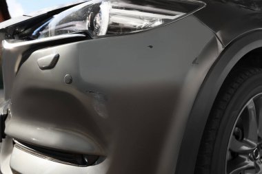 Modern black car with scratch, closeup view