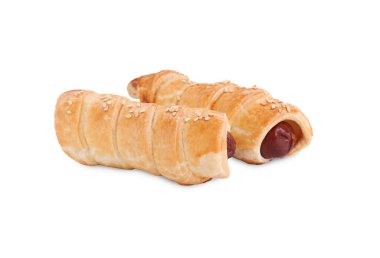 Delicious homemade sausage rolls isolated on white
