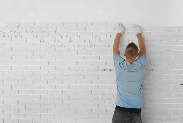Professional Builder Installing New White Decorative Bricks Wall Back View — Fotografia de Stock