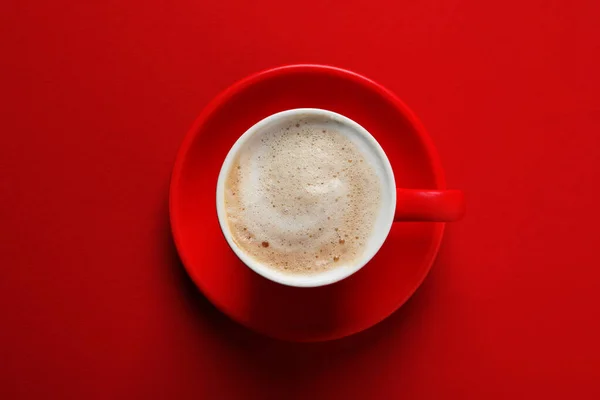 Cup Aromatic Cappuccino Red Background Top View — Stockfoto
