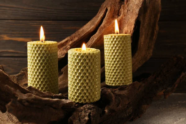 Beautiful Burning Beeswax Candles Snag Wooden Wall — Foto Stock