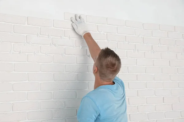 Professional Builder Installing New White Decorative Bricks Wall Back View —  Fotos de Stock