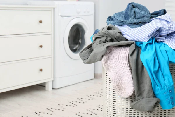 Plastic Laundry Basket Overfilled Clothes Bathroom Closeup Space Text — Fotografia de Stock