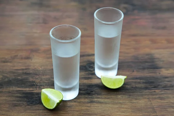 Mexican Tequila Shots Lime Slices Wooden Table Drink Made Agave — Stock Fotó