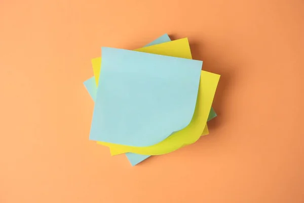 Blank Paper Notes Pale Orange Background Flat Lay — Stockfoto