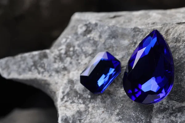 Two Beautiful Blue Gemstones Jewelry Stone Surface Closeup Space Text — Stockfoto