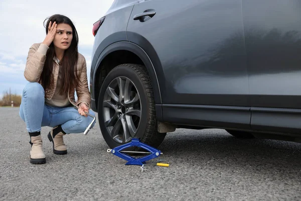 Worried Young Woman Car Punctured Wheel Roadside — 스톡 사진