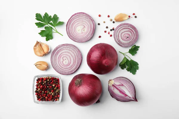 Fresh Red Onions Garlic Parsley Spices White Background Flat Lay — стоковое фото