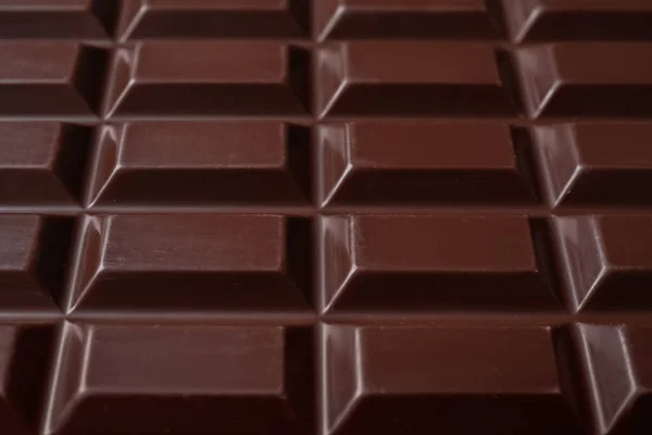 맛있고 어두운 초콜릿 배경으로 클로즈업 — 스톡 사진