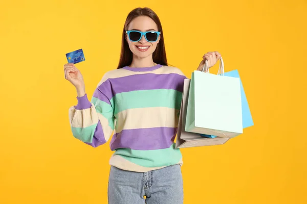 Happy Young Woman Shopping Bags Credit Card Yellow Background Big —  Fotos de Stock