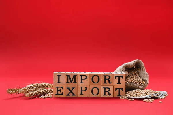 Palabras Importación Exportación Hecha Cubos Madera Bolsa Con Granos Trigo —  Fotos de Stock