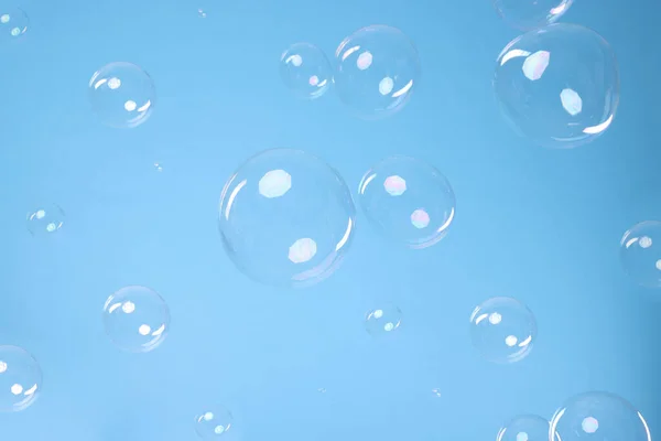 Many Beautiful Soap Bubbles Light Blue Background Space Text — Φωτογραφία Αρχείου