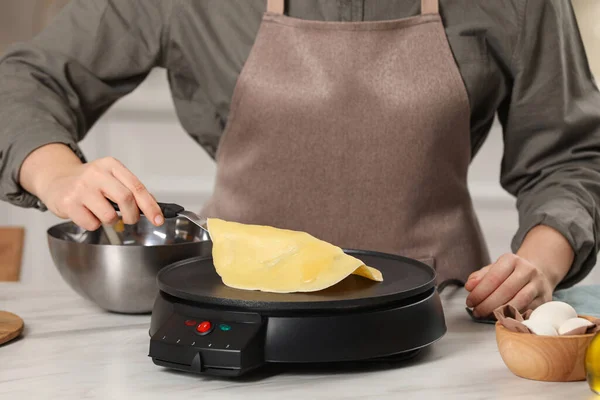 Woman Cooking Delicious Crepe Electric Pancake Maker White Marble Table — Stock Photo, Image