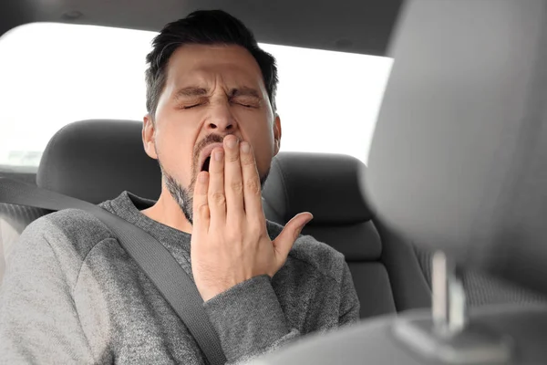 Sleepy Handsome Man Yawning While Sitting Modern Car — 图库照片