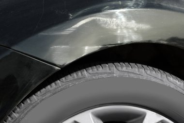 Modern black car with scratch, closeup view