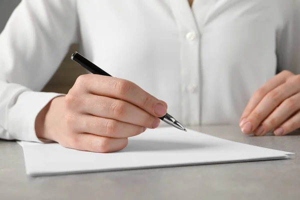 Woman Pen Paper Sheets Grey Table Closeup — Fotografia de Stock