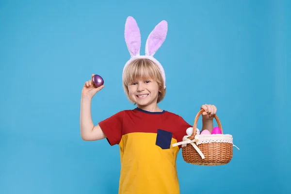 Happy Boy Bunny Ears Headband Holding Wicker Basket Painted Easter — Stock Photo, Image