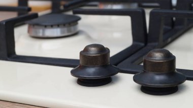 Modern gas cooktop in kitchen, closeup. Cooking appliance