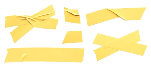 Koláž Kousky Žluté Izolační Pásky Bílém Pozadí Horní Pohled — Stock fotografie