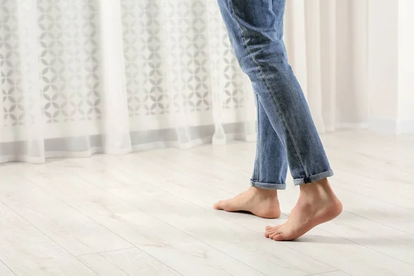 Barefoot Man Walking White Parquet Indoors Closeup Heated Floor — Stock Photo, Image