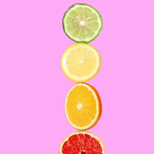 Stack Different Fresh Citrus Fruits Pink Background — Stock Photo, Image