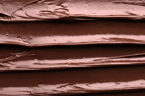 Delicious chocolate paste as background, top view