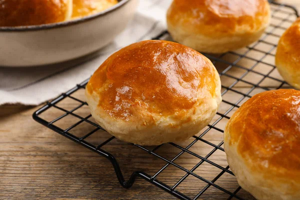 stock image Tasty scones prepared on soda water on wooden table