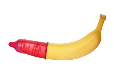 Banana with condom isolated on white. Safe sex concept