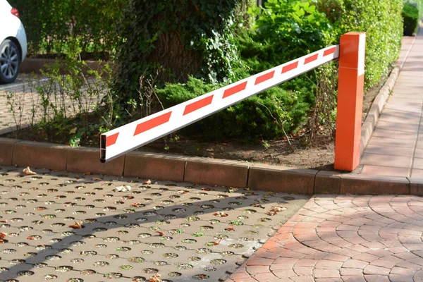 stock image Closed boom barrier on sunny day outdoors