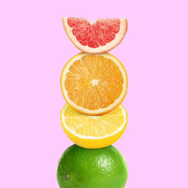 Stack Different Fresh Citrus Fruits Pale Pink Background — Stock Photo, Image
